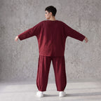 Weinrote Ballonhose aus French Terry mit Smiley-Print Biesennähten und softem Komfort