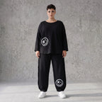 Ballonhose in Midnight Black aus French Terry mit Stretch und Smiley Detail vorn am Bein