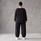 Ballonhose in Midnight Black aus French Terry mit Stretch und Smiley Detail vorn am Bein