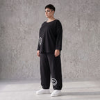Ballonhose in Midnight Black aus French Terry mit Stretch und Smiley Detail vorn am Bein