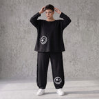 Ballonhose in Midnight Black aus French Terry mit Stretch und Smiley Detail vorn am Bein