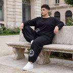 Ballonhose in Midnight Black aus French Terry mit Stretch und Smiley Detail vorn am Bein