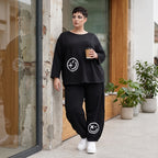 Ballonhose in Midnight Black aus French Terry mit Stretch und Smiley Detail vorn am Bein