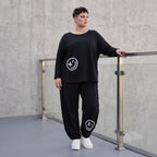 Ballonhose in Midnight Black aus French Terry mit Stretch und Smiley Detail vorn am Bein