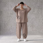 Taupe Ballonhose aus weichem French Terry mit Smileymuster Biesennähten und Dehnbund