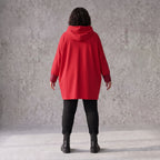 Roter Kapuzenpullover aus French Terry mit Leoprint Seitentaschen und Vokuhilasaum
