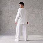 Oversizehose aus warmem French Terry mit Smileyprint gesmoktem Saum und Seitentaschen