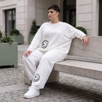 Oversizehose aus warmem French Terry mit Smileyprint gesmoktem Saum und Seitentaschen