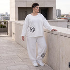 Oversizehose aus warmem French Terry mit Smileyprint gesmoktem Saum und Seitentaschen