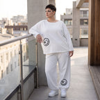 Oversizehose aus warmem French Terry mit Smileyprint gesmoktem Saum und Seitentaschen