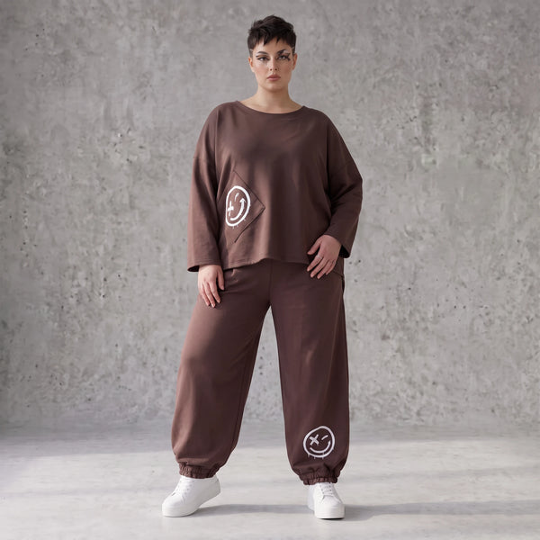 Lässige Oversizedhose aus French Terry mit Smileyprint und gesmoktem Saum extra lang