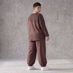 Lässige Oversizedhose aus French Terry mit Smileyprint und gesmoktem Saum extra lang