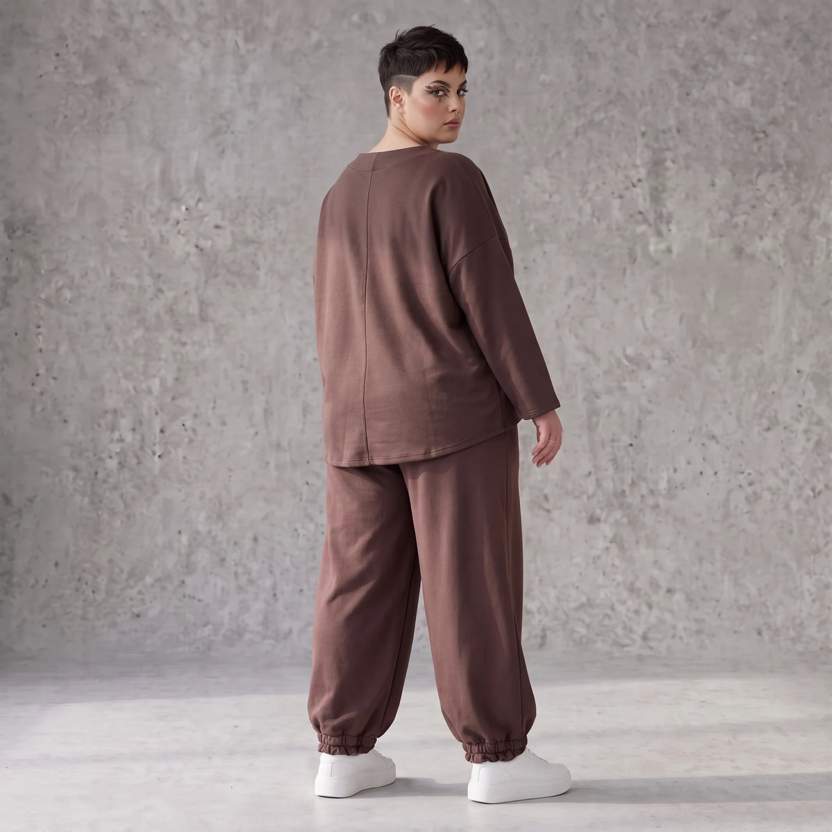 Lässige Oversizedhose aus French Terry mit Smileyprint und gesmoktem Saum extra lang