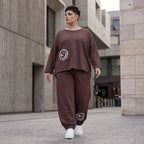 Lässige Oversizedhose aus French Terry mit Smileyprint und gesmoktem Saum extra lang