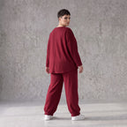 Oversized French Terry Hose in Schwarz mit Smileyprint gesmoktem Saum und weitem Bein