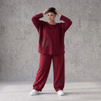 Oversized French Terry Hose in Schwarz mit Smileyprint gesmoktem Saum und weitem Bein