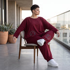 Oversized French Terry Hose in Schwarz mit Smileyprint gesmoktem Saum und weitem Bein