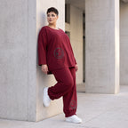 Oversized French Terry Hose in Schwarz mit Smileyprint gesmoktem Saum und weitem Bein