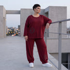 Oversized French Terry Hose in Schwarz mit Smileyprint gesmoktem Saum und weitem Bein