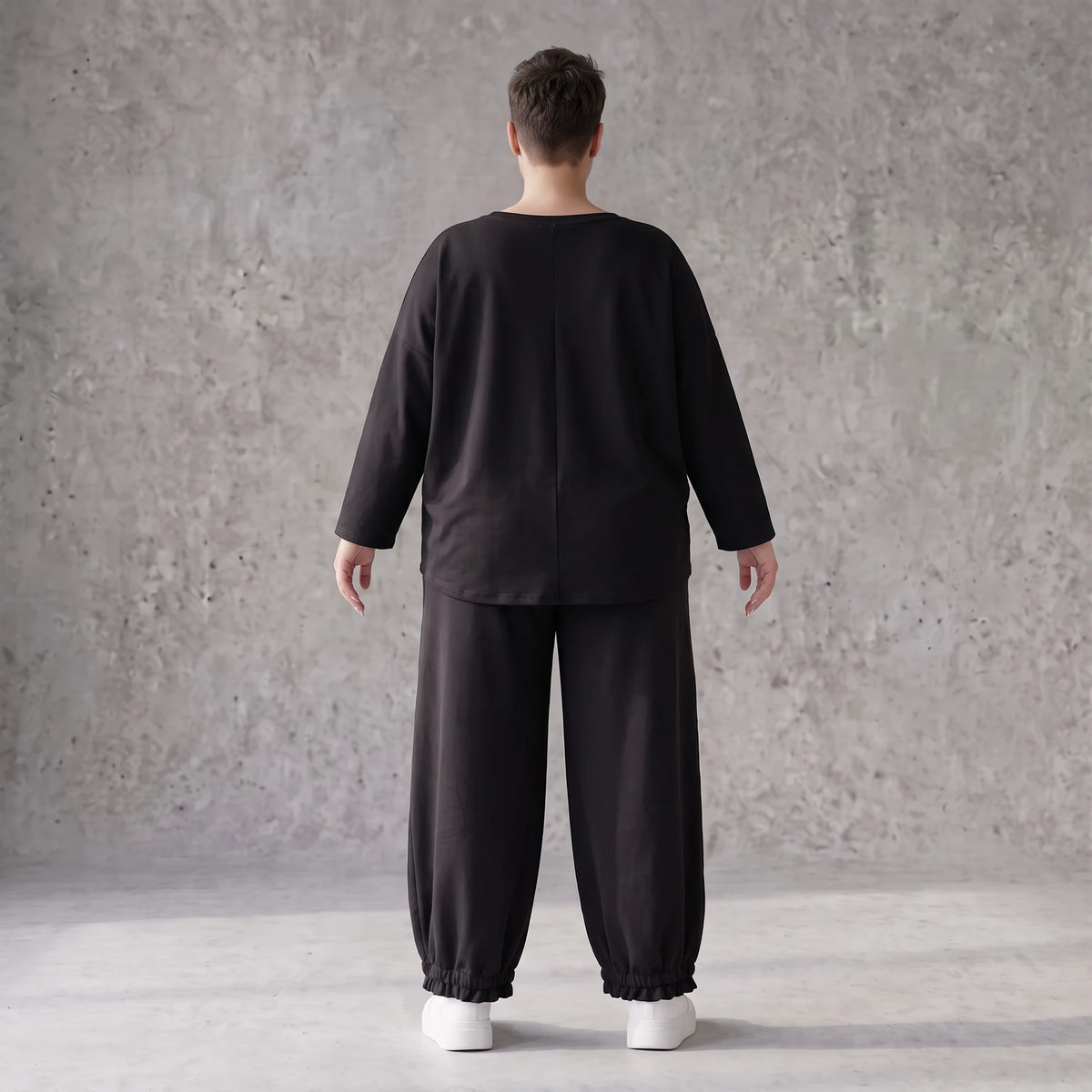 Oversized Hose aus flauschigem French Terry mit Smileydruck und bequem gesmoktem Saum