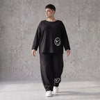 Oversized Hose aus flauschigem French Terry mit Smileydruck und bequem gesmoktem Saum