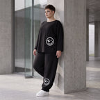 Oversized Hose aus flauschigem French Terry mit Smileydruck und bequem gesmoktem Saum