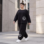 Oversized Hose aus flauschigem French Terry mit Smileydruck und bequem gesmoktem Saum