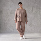 French-Terry Oversizedhose mit Smiley-Print gesmoktem Saum und Seitentaschen Streetstyle