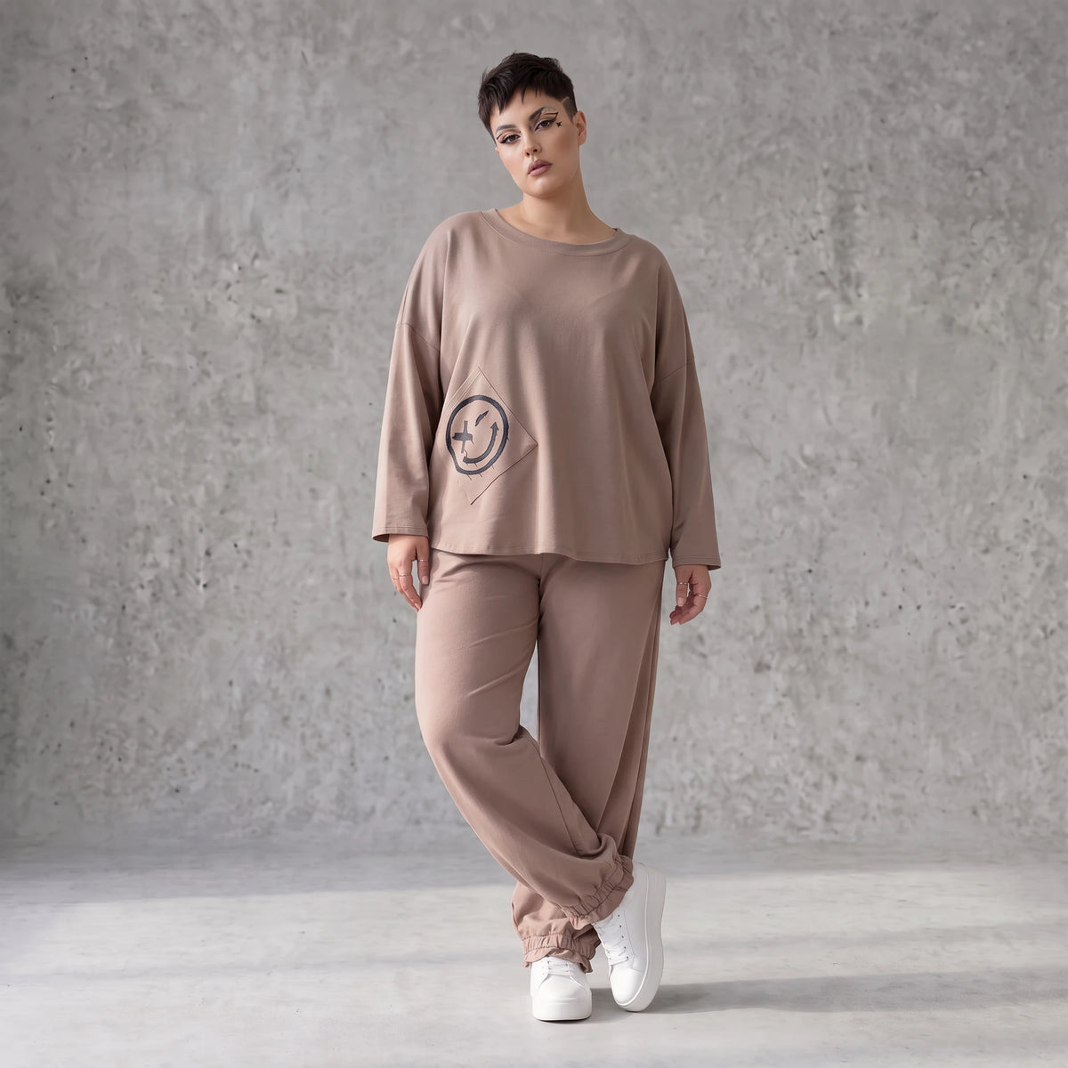 French-Terry Oversizedhose mit Smiley-Print gesmoktem Saum und Seitentaschen Streetstyle
