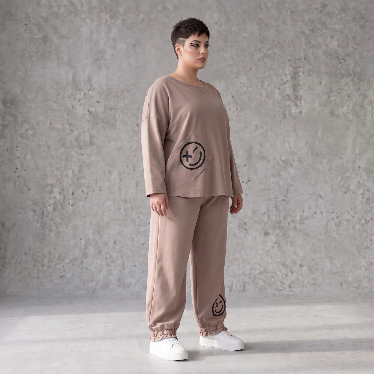 French-Terry Oversizedhose mit Smiley-Print gesmoktem Saum und Seitentaschen Streetstyle