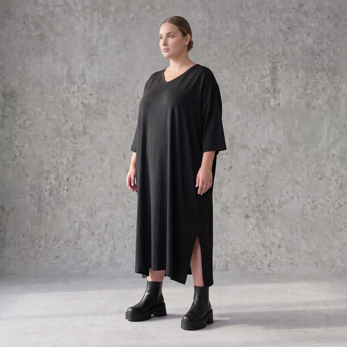 Fließendes A-Linien-Kleid aus Lyocell mit V-Ausschnitt Seitennahttaschen Saumschlitzen