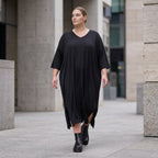 Fließendes A-Linien-Kleid aus Lyocell mit V-Ausschnitt Seitennahttaschen Saumschlitzen