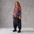 Langarmshirt aus Romanit Jersey in Schwarz/Orange mit Glockenschnitt pflegeleicht weich