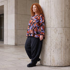 Langarmshirt aus Romanit Jersey in Schwarz/Orange mit Glockenschnitt pflegeleicht weich