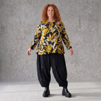 Langarmshirt in Schwarz/Gelb aus Romanit Jersey mit Rundhalsausschnitt in Glockenform