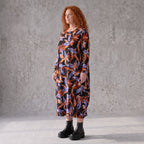 Weiches Romanitjerseykleid in Schwarz/Orange mit Ballonform Langarm Rundhalsausschnitt