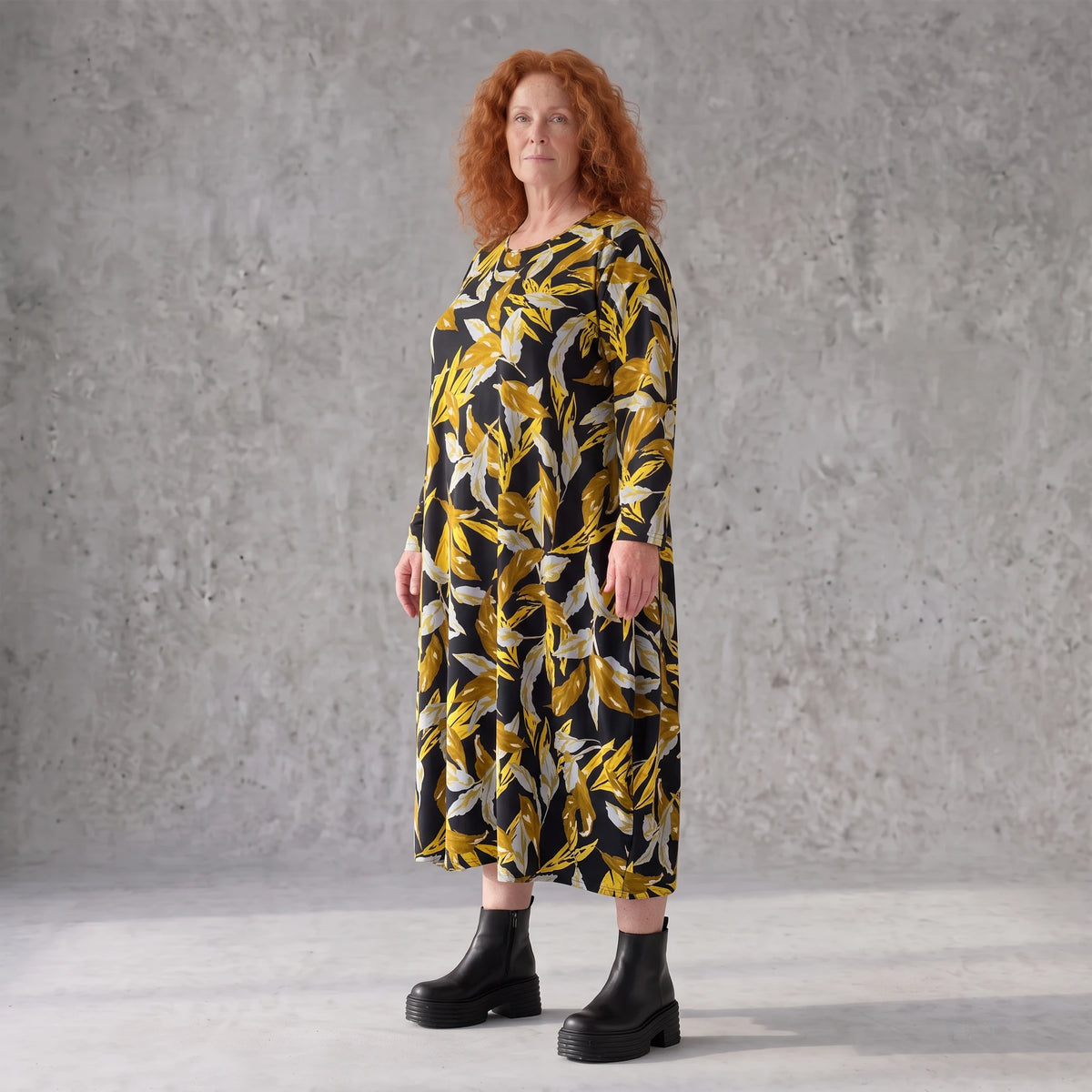 Ballonkleid aus Schwarz/Gelb Romanitjersey mit Langarm und weichem Rundhalsausschnitt