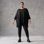 Warmes schwarzes Strickshirt in A-Linie mit Stretch und Destroyedoptik für Winterlooks