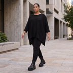 Warmes schwarzes Strickshirt in A-Linie mit Stretch und Destroyedoptik für Winterlooks