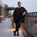 Warmes schwarzes Strickshirt in A-Linie mit Stretch und Destroyedoptik für Winterlooks