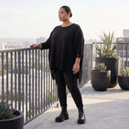 Warmes schwarzes Strickshirt in A-Linie mit Stretch und Destroyedoptik für Winterlooks