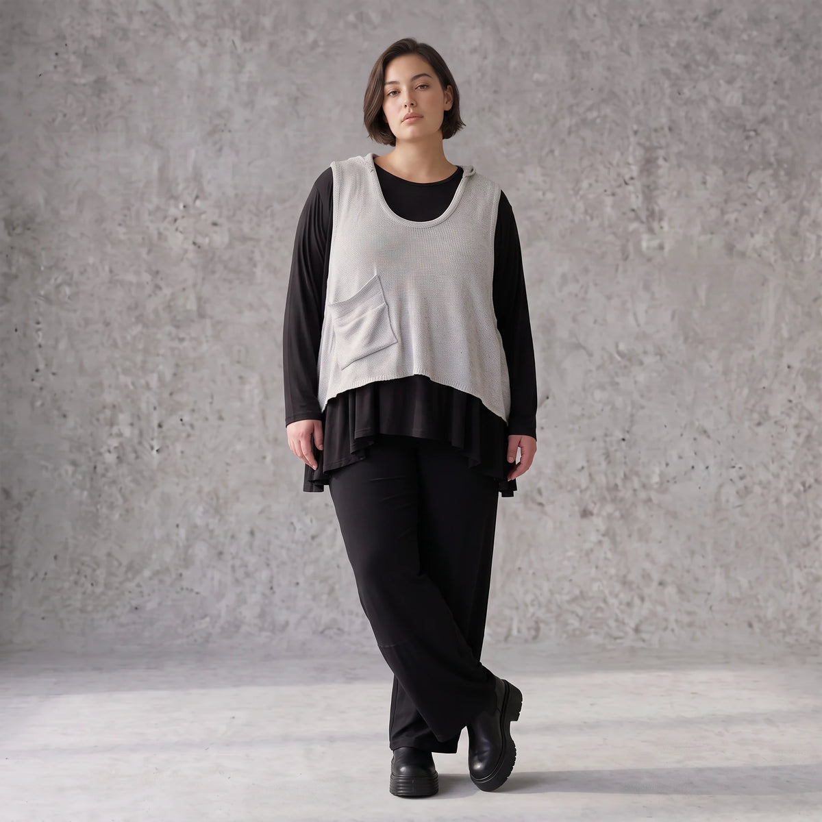 Ärmelloser Stricküberwurf in A-Linie mit Kapuze Tunnelzug Tasche und Baumwollstretch