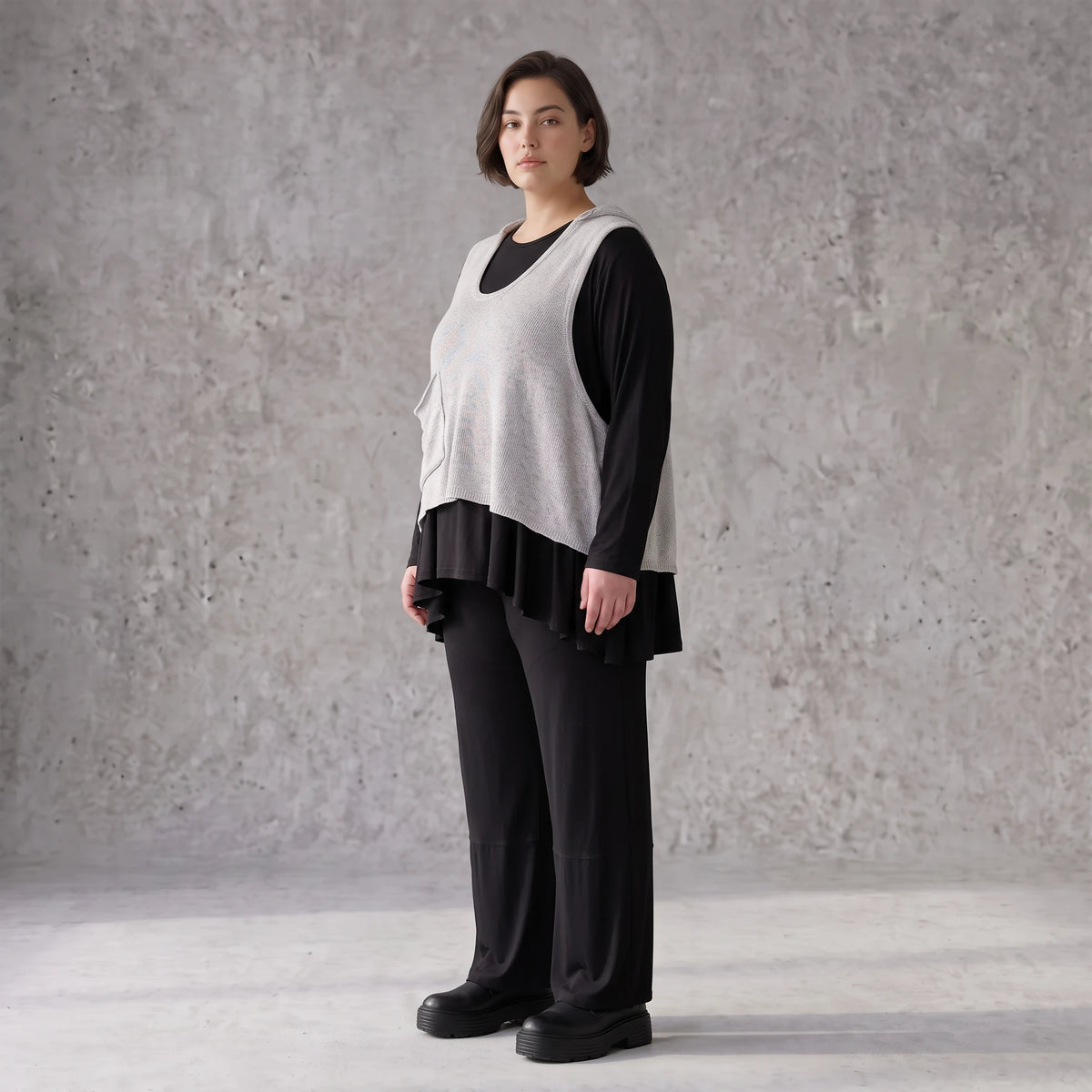 Ärmelloser Stricküberwurf in A-Linie mit Kapuze Tunnelzug Tasche und Baumwollstretch
