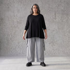 Ballonhose aus Bengaline in Schwarz/Weiß mit Stretch elastischem Bund und Fransentaschen
