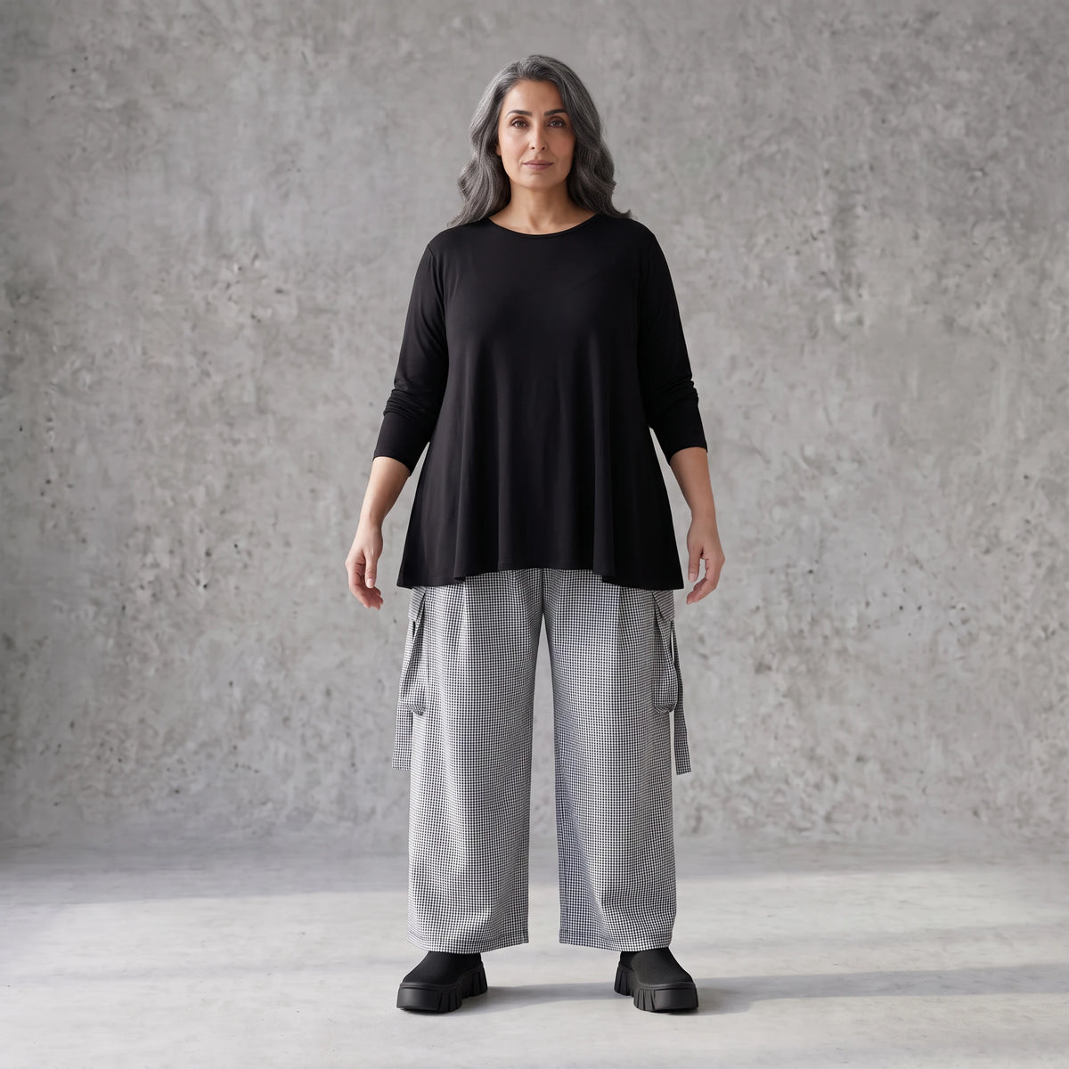 Ballonhose aus Bengaline in Schwarz/Weiß mit Stretch elastischem Bund und Fransentaschen