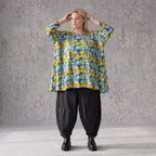 Jerseyshirt in Gelb/Multi mit Rundhalsausschnitt in A-Linie und 7/8-Arm lässig
