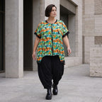 Vokuhilaweste aus softem Stretchjersey mit Netzdetail und lockerem Schnitt modern chic