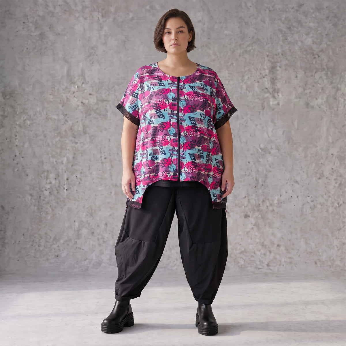 Asymmetrische Vokuhilaweste aus Jersey und Netzstoff im Materialmix vorne kurz hinten lang