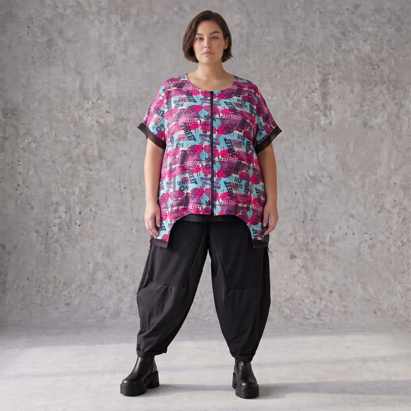 Asymmetrische Vokuhilaweste aus Jersey und Netzstoff im Materialmix vorne kurz hinten lang
