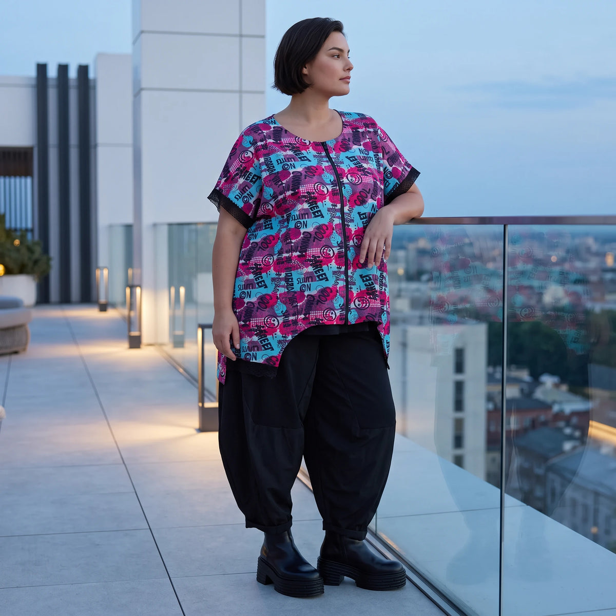 Asymmetrische Vokuhilaweste aus Jersey und Netzstoff im Materialmix vorne kurz hinten lang